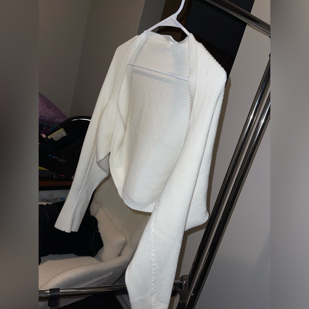 White shrug sweater